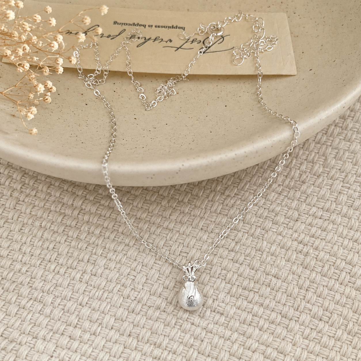 Lucky Bag Bow Pendant Necklace in 999 Pure Silver