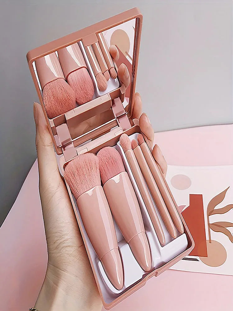 Compact foldable brush case with mirror and mini makeup brushes