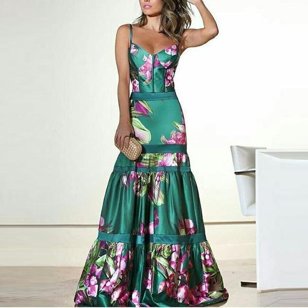 Woman wearing a floral dress with a white background