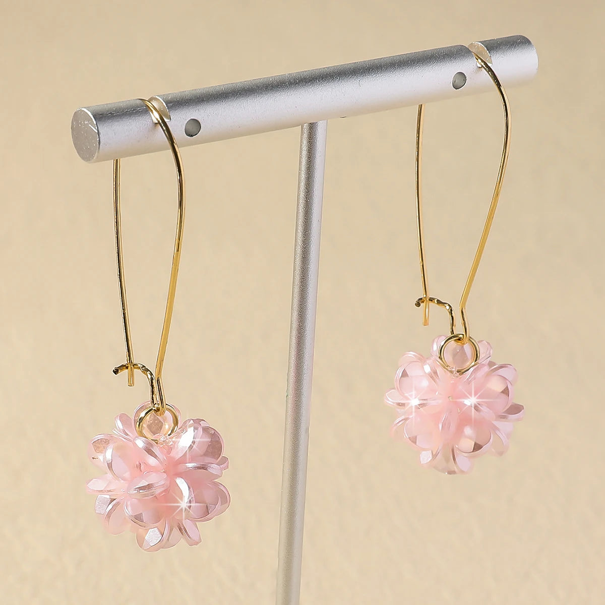 Detailed petal-inspired spherical earrings – lightweight and stylish