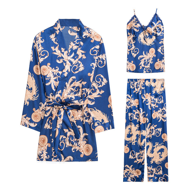 Blue pajama set with white floral patterns on a white background