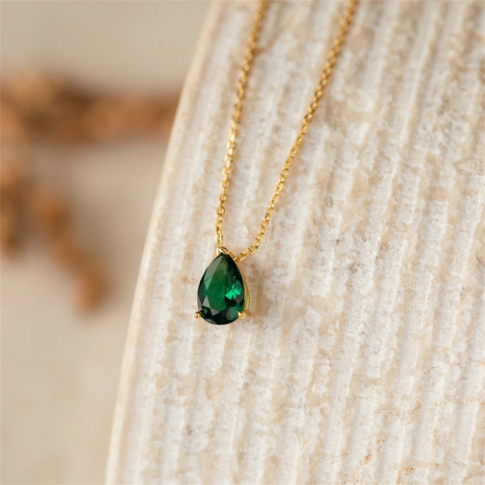 Boho gold choker featuring dainty peridot-inspired zircon drop pendant