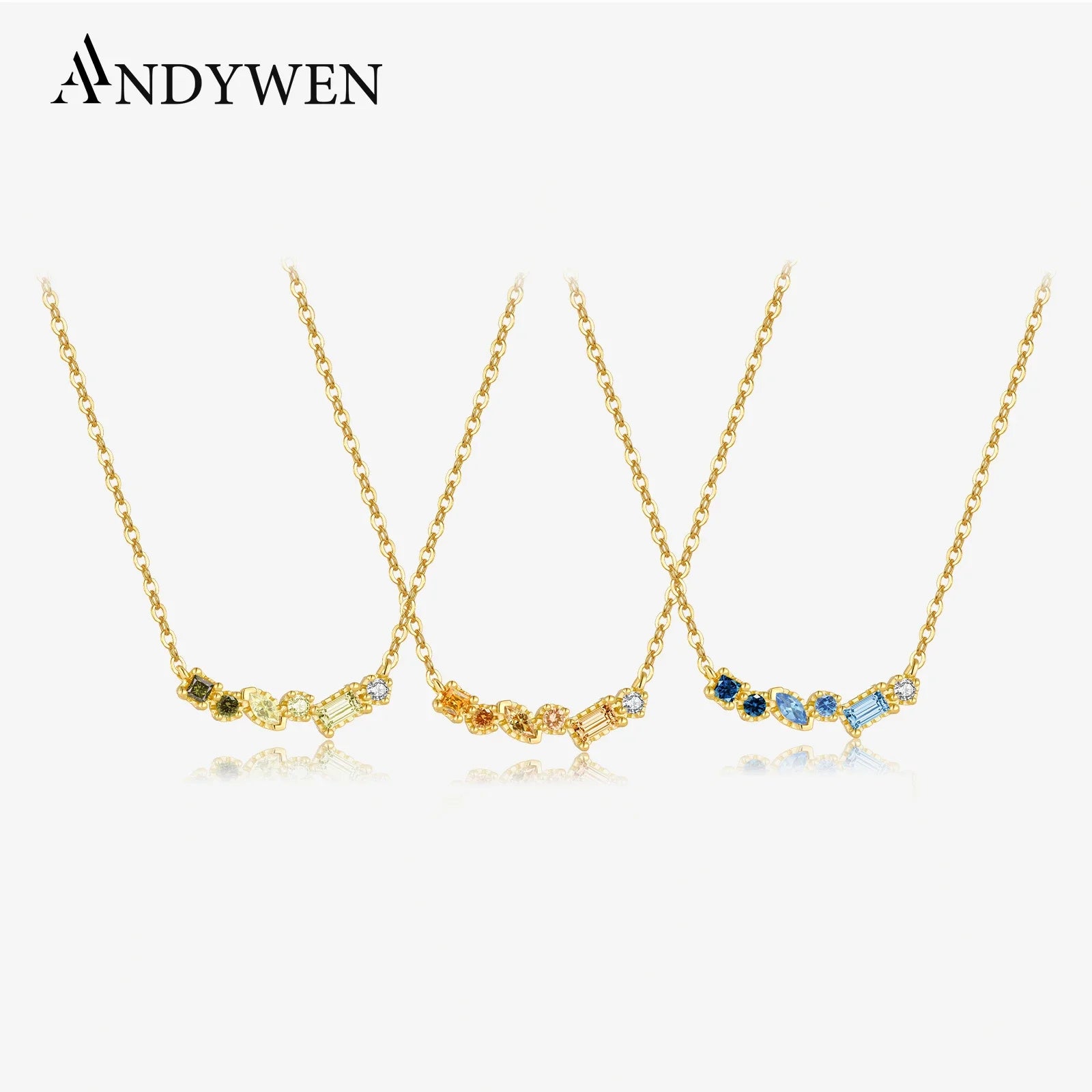Gold-plated sterling silver necklace with blue CZ birthstone pendant by ANDYWEN