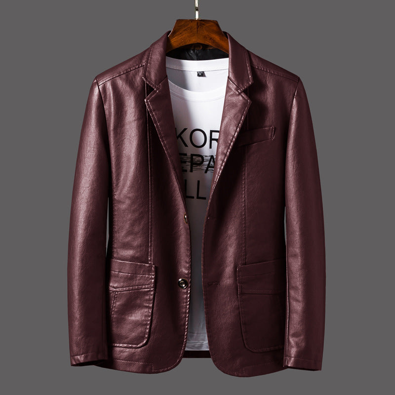 Brown leather jacket on a hanger with a gray background