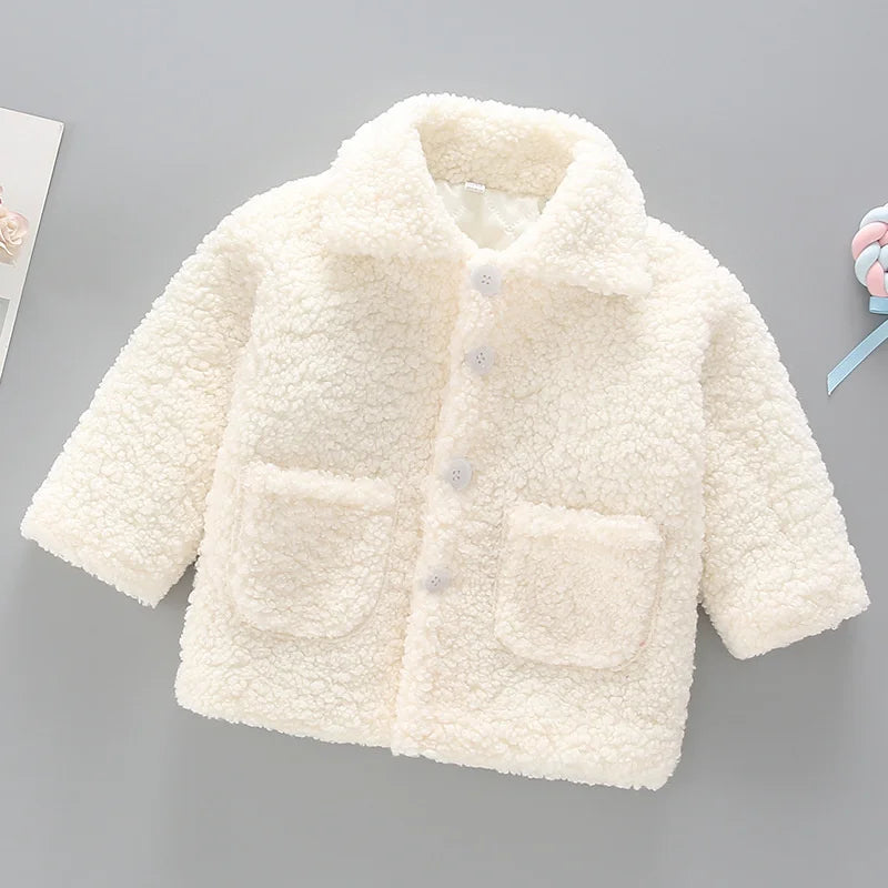 Soft lamb’s wool texture on children’s warm winter coat