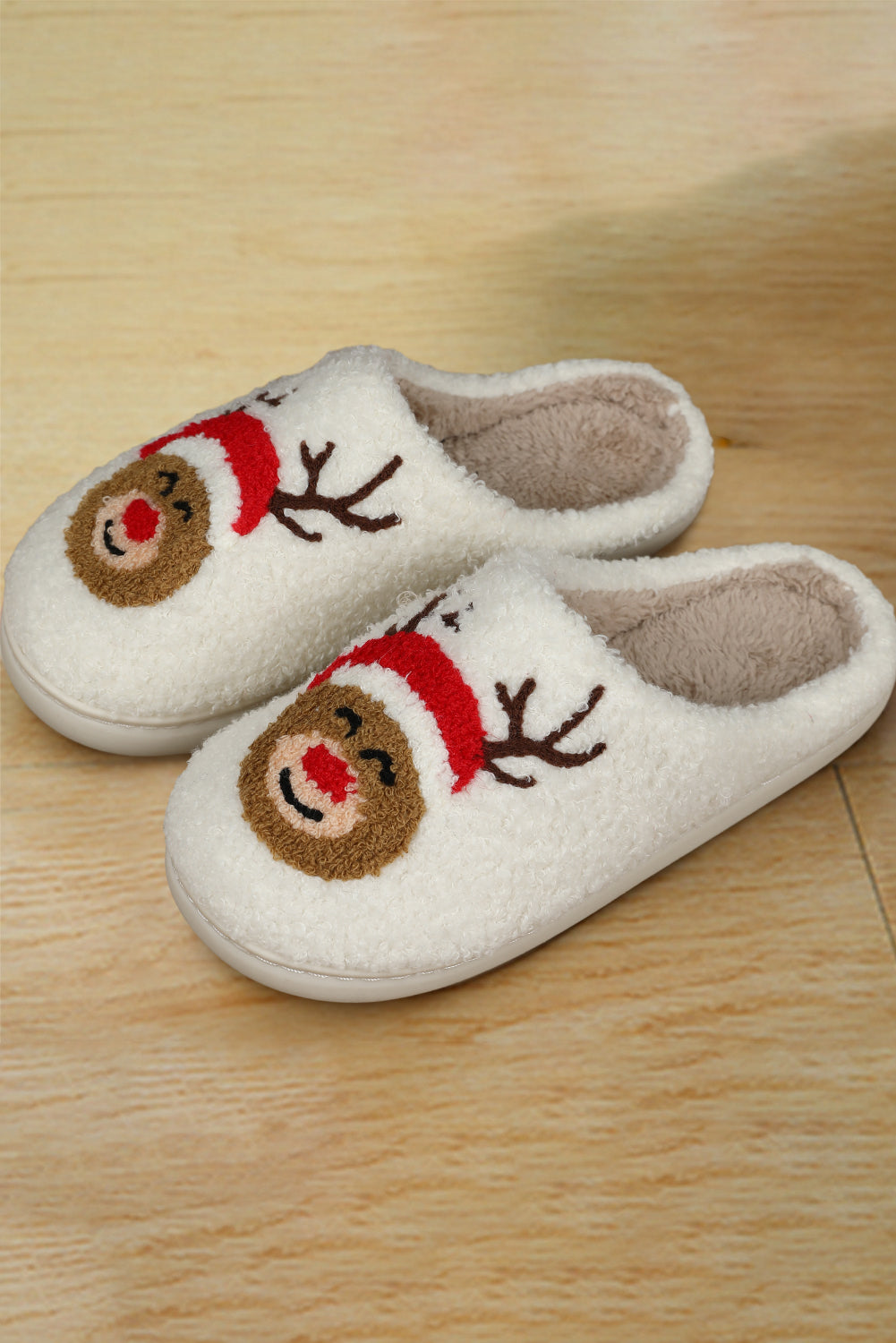 Soft plush fabric with festive deer pattern – warm Christmas slippers for women