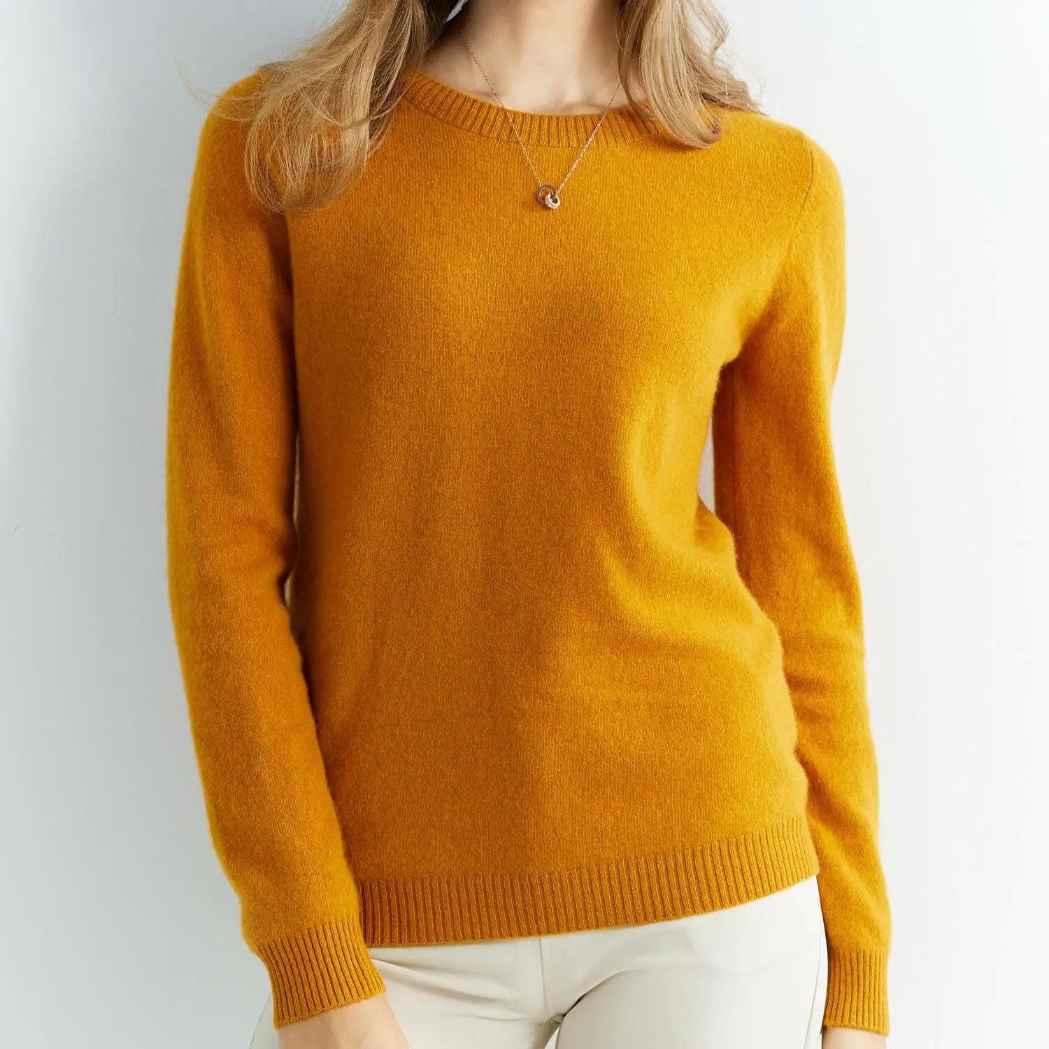 Woman wearing vintage O-neck merino wool sweater – elegant cozy winter outfit