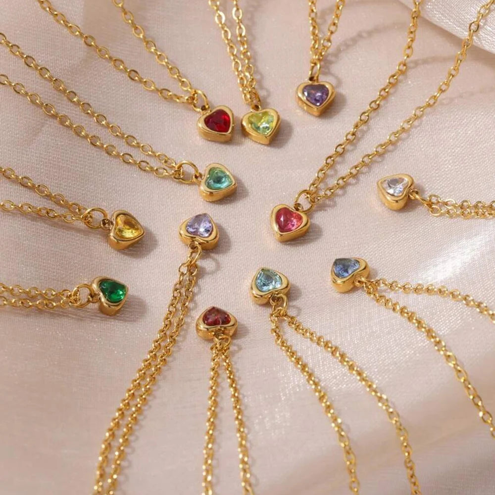 Minimalist gold choker with red heart pendant