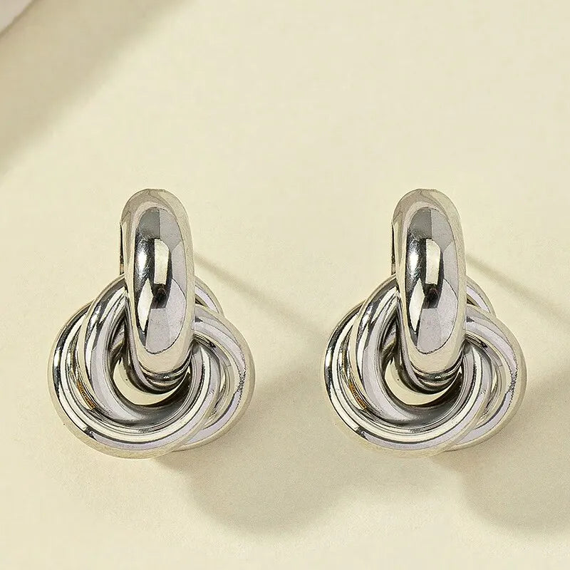 Gold and silver knot design hoop earrings – minimal and stylish