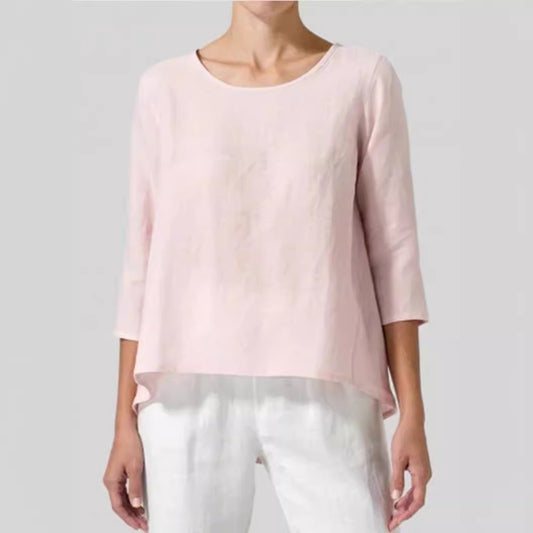 Woman wearing army green cotton linen loose casual top with 3/4 sleeves and relaxed fit.