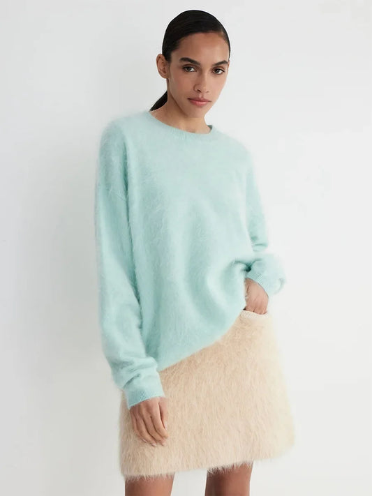 Woman wearing loose solid color sweater – cozy casual autumn outfit