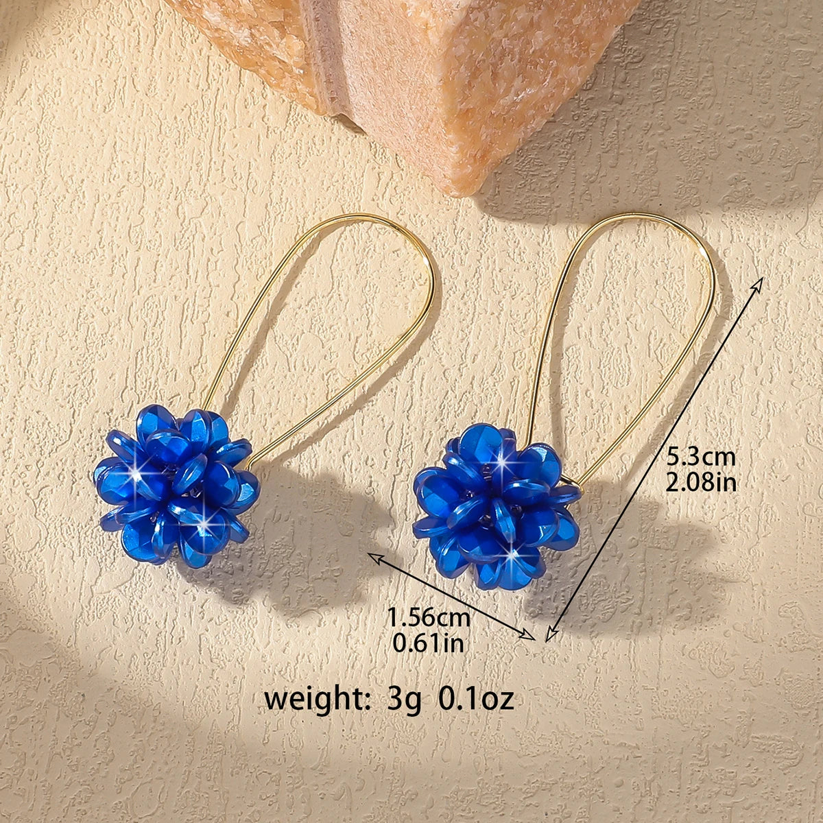 Detailed petal-inspired spherical earrings – lightweight and stylish