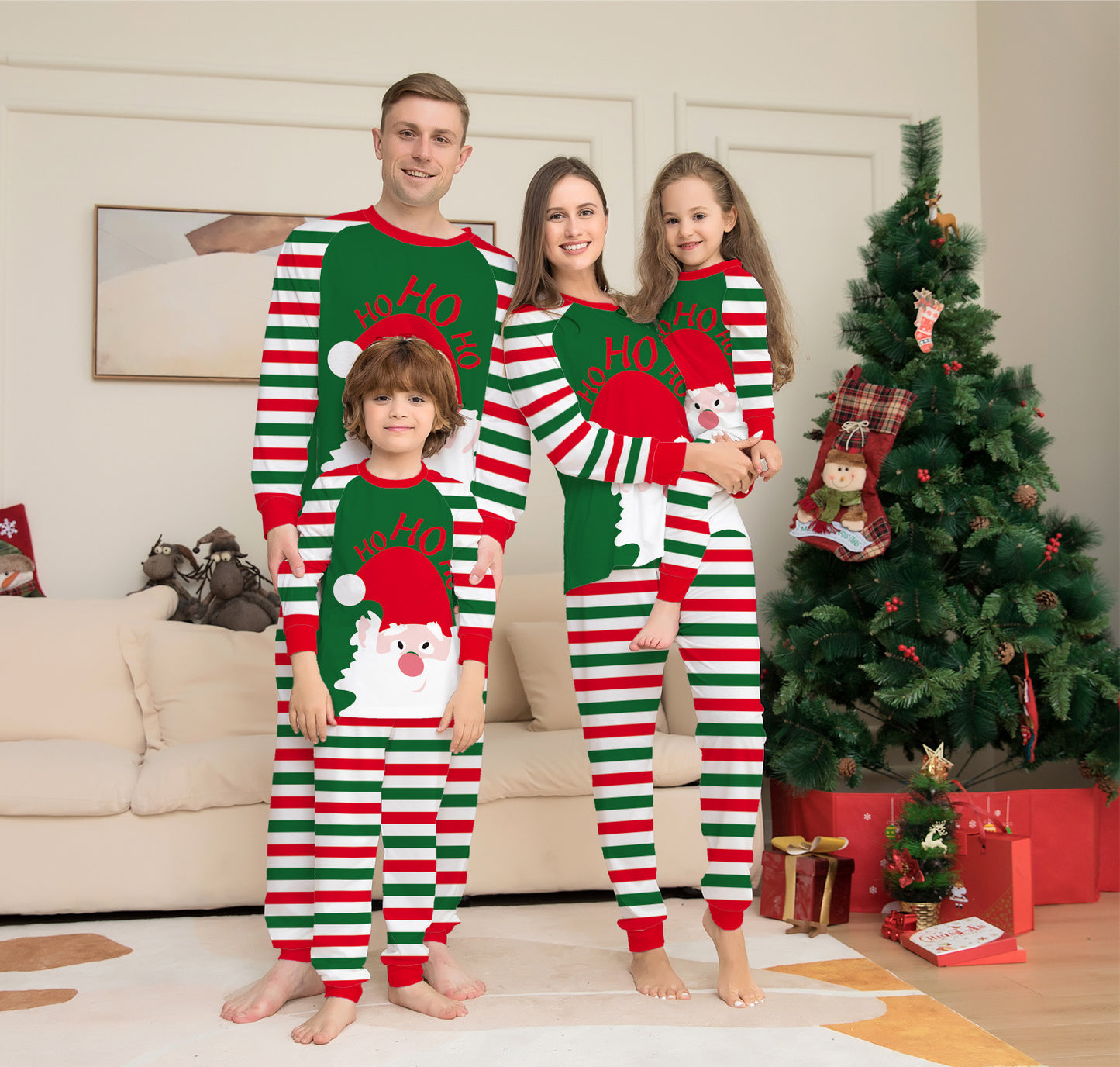 Family and dog wearing red striped Christmas pajamas – festive holiday matching set.”