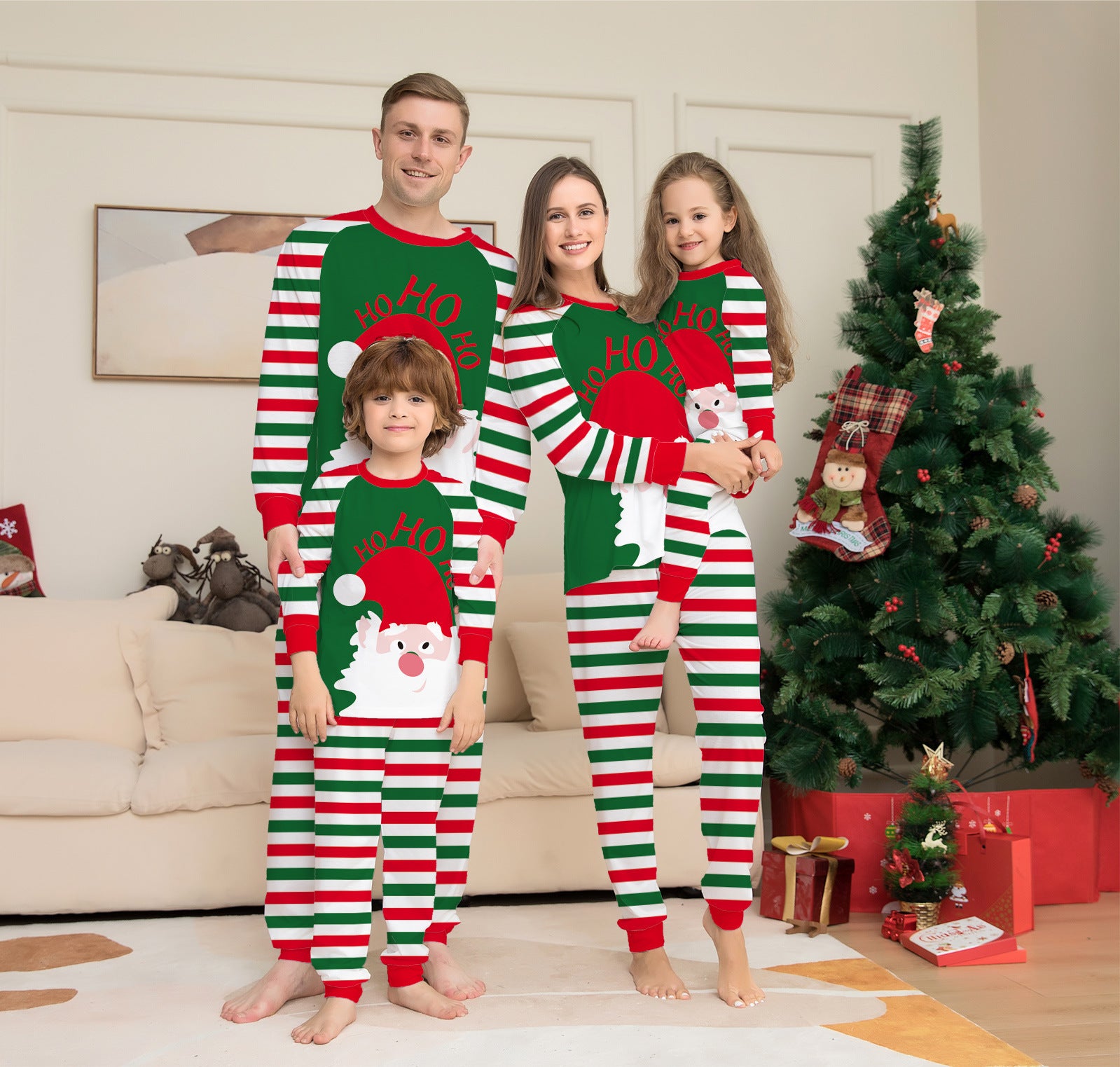 Family and dog wearing red striped Christmas pajamas – festive holiday matching set.”