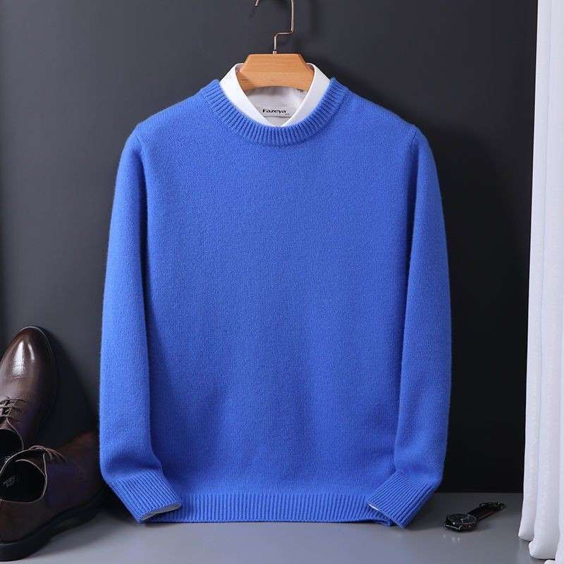 Men’s bright blue crew-neck knit sweater with thick fabric and relaxed fit for fall and winter wear
