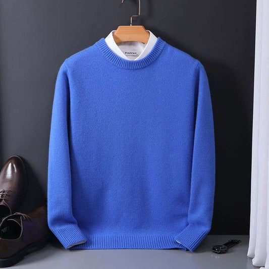 Men’s bright blue crew-neck knit sweater with thick fabric and relaxed fit for fall and winter wear