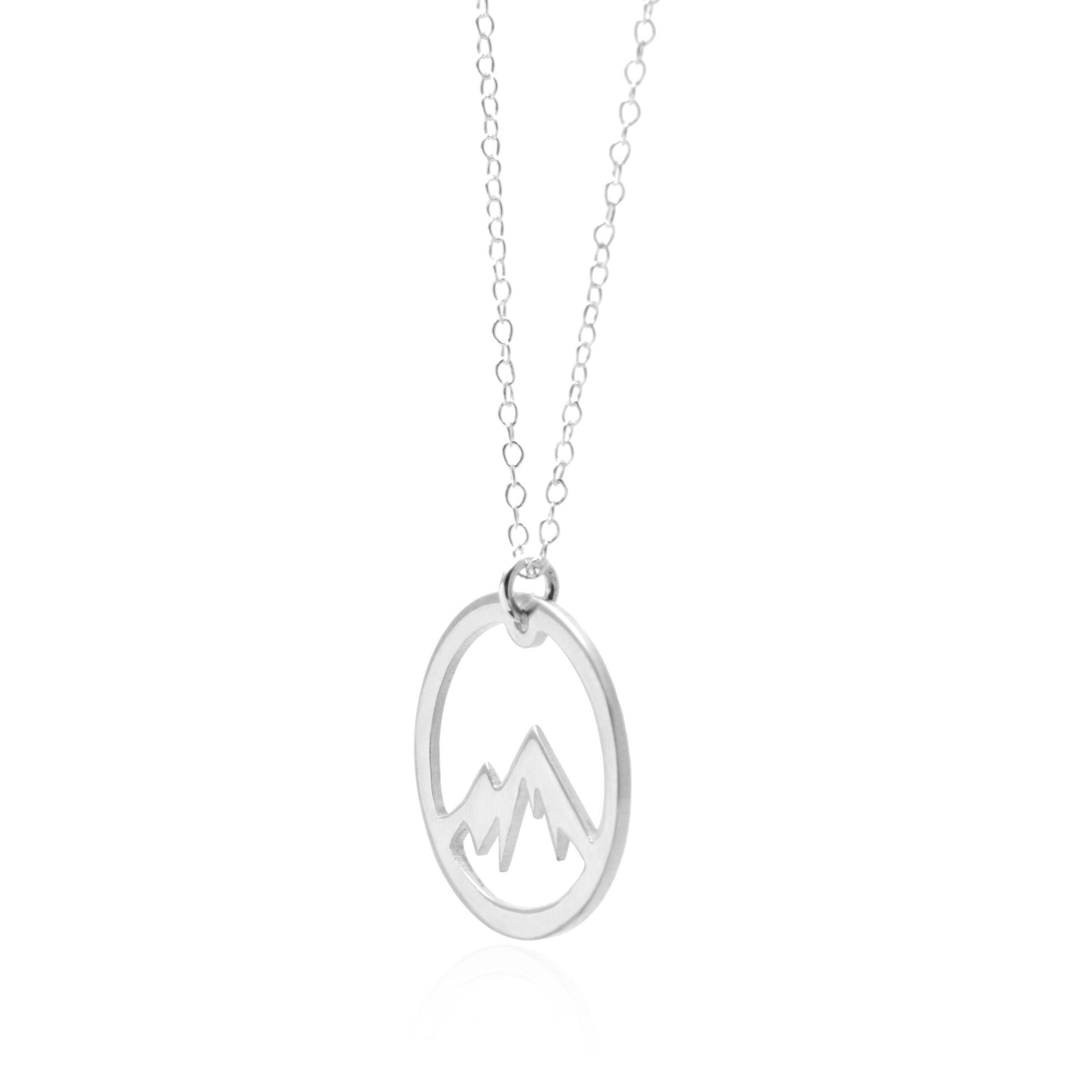 Detailed silver mountain silhouette pendant on fine silver chain